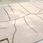 Red Dotted Sidewalk Cracks